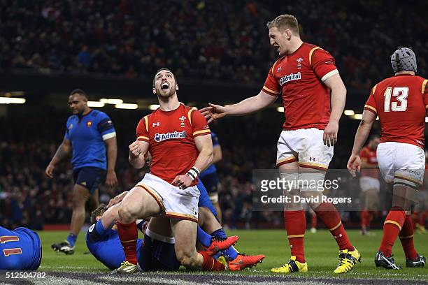 George North of Wales celebrates with teammate Bradley Davies after scoring the opening try during the RBS Six Nations match between Wales and France...