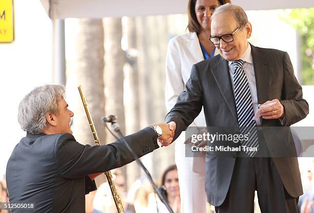 Andrea Griminelli and Ennio Morricone attend the ceremony honoring Ennio Morricone with a Star on The Hollywood Walk of Fame held on February 26,...