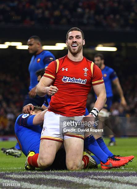 George North of Wales celebrates after scoring his team's opening try during the RBS Six Nations match between Wales and France at the Principality...