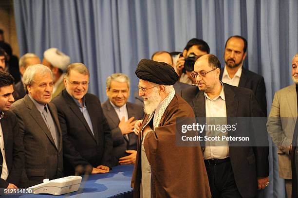 Iran's Supreme Leader Ayatollah Seyyed Ali Khamenei casts the first ballot in key elections for Parliament and the Assembly of Experts in Tehran,...