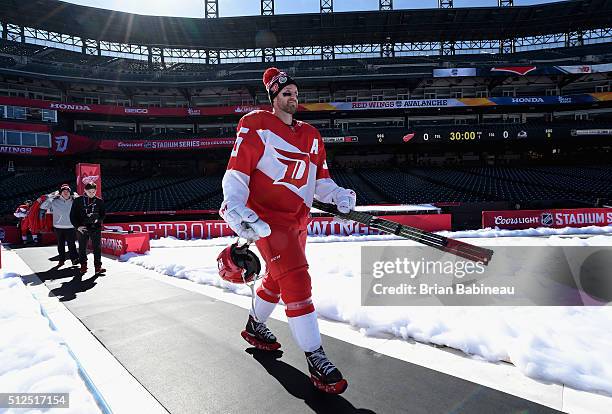 Niklas Kronwall of the Detroit Red Wings makes his way to the ice surface prior to practice for the 2016 Coors Light Stadium Series between the...