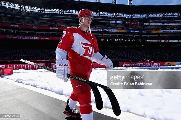 Brendan Smith of the Detroit Red Wings makes his way to the ice surface prior to practice for the 2016 Coors Light Stadium Series between the Detroit...