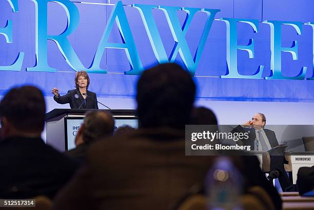 Senator Lisa Murkowski, a Republican from Alaska, left, speaks as Daniel Yergin, vice chairman of IHS Cambridge Energy Research Associates Inc.,...