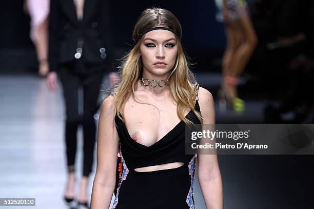 Gigi Hadid walks the runway at the Versace show during Milan Fashion Week Fall/Winter 2016/17 on February 26, 2016 in Milan, Italy.