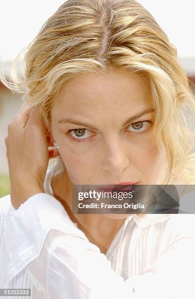 Italian Actress Claudia Gerini poses at the "Mostra Internazionale d'Arte Cinematografica" Jury Photocall at the Lido at the 61st Venice Film...