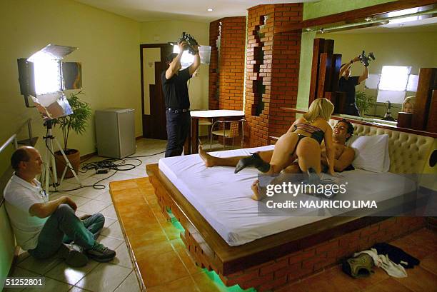 Brazilian porno actress Judie and actor Tony have sex during the recording of a new movie produced by Buttman, specialized in pornographic films 19...