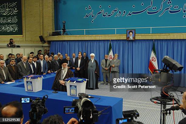 Iran's Supreme Leader Ayatollah Seyyed Ali Khamenei casts the first ballot in key elections for Parliament and the Assembly of Experts in Tehran,...