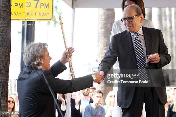 Flutist Andrea Griminelli and composer Ennio Morricone attend a ceremony honoring composer Ennio Morricone wtih a star on The Hollywood Walk Of Fame...