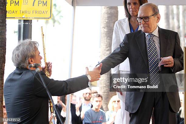 Flutist Andrea Griminelli and composer Ennio Morricone attend a ceremony honoring composer Ennio Morricone wtih a star on The Hollywood Walk Of Fame...