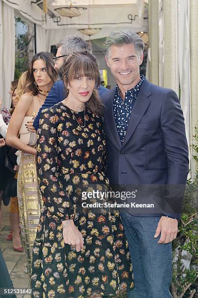 Merle Ginsberg and guest attend NET-A-PORTER Celebrates Women Behind The Lens at Chateau Marmont on February 26, 2016 in Los Angeles, California.