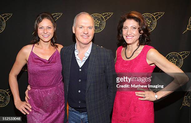 Actors Vanessa Cloke, Michael Keaton, and Amy Aquino pose backstage at the 53rd Annual ICG Publicists Awards at The Beverly Hilton Hotel on February...