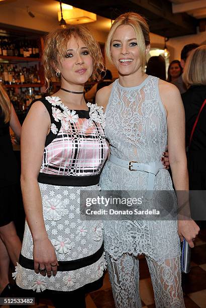 Actresses Juno Temple and Elizabeth Banks attend the Vanity Fair and Stuart Weitzman Luncheon to celebrate Elizabeth Banks at A.O.C on February 26,...