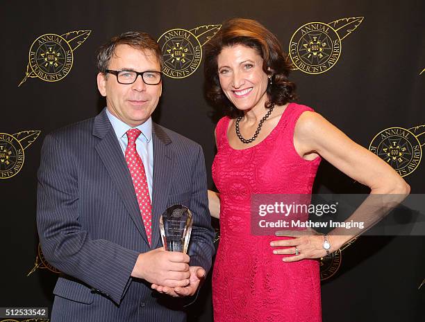Journalist Bryan Alexander, winner of the press award, and Amy Aquino pose backstage at the 53rd Annual ICG Publicists Awards at The Beverly Hilton...