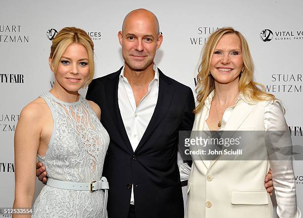 Actress Elizabeth Banks, Publisher and CRO, Vanity Fair Chris Mitchell, and CMO of Stuart Weitzman Susan Duffy attend the Vanity Fair and Stuart...