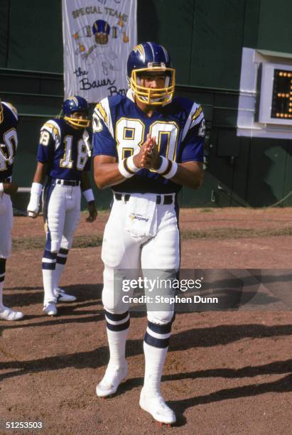 Kellen Winslow of the San Diego Chargers walks into the stadium before a 1986 NFL season game at Jack Murphy Stadium in San Diego, California.