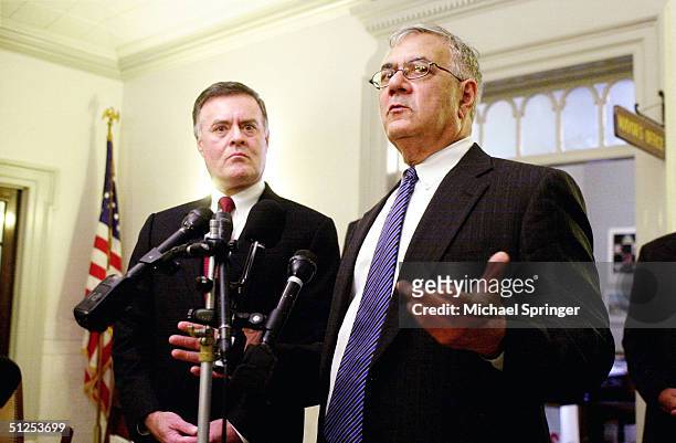 Representative Barney Frank speaks to reporters as Bank of America President and CEO Kenneth Lewis looks on following a meeting between Massachusetts...