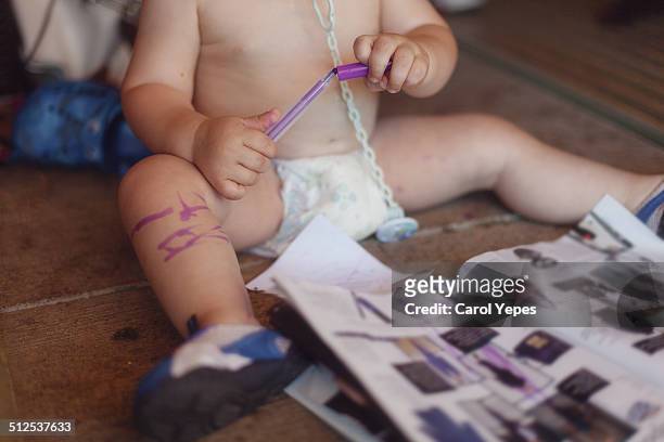 boy painting himself - baby accessories the dummy stock pictures, royalty-free photos & images