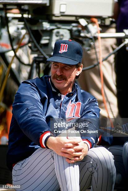 Jack Morris of the Minnesota Twins looks on from the end of the dugout against the Oakland Athletics during an Major League Baseball game circa 1991...