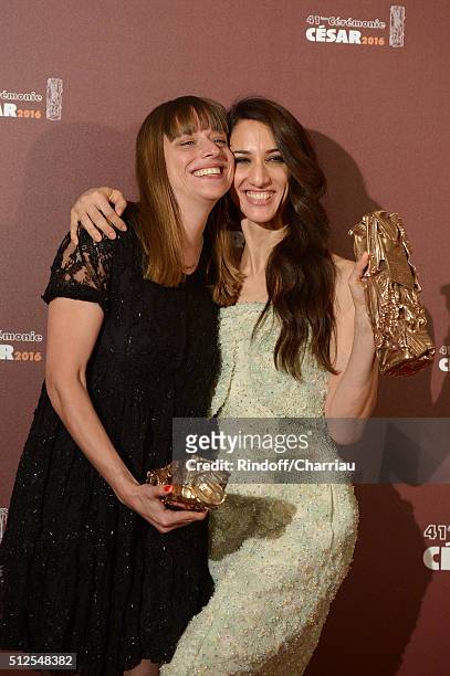 Alice Winocour and Deniz Gamze Erguven pose with their awards of Best Script and Best First Feature for the movie 'Mustang' during The Cesar Film...