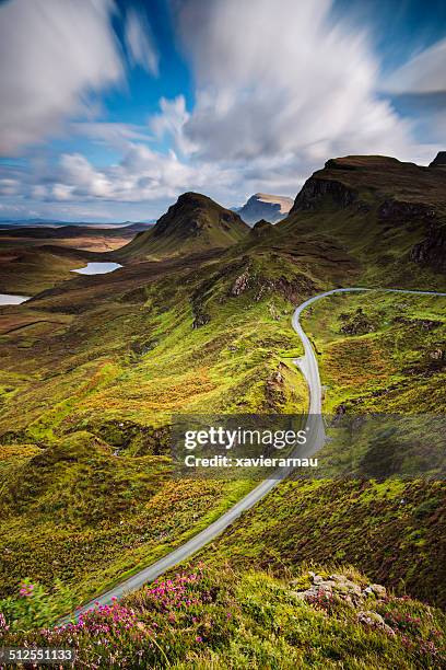 road in the quiraing mountains - scottish highlands stock pictures, royalty-free photos & images