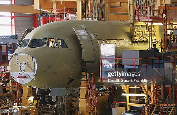 Construction work continues at he Airbus factory on September 1, 2004 in Hamburg, Germany. Airbus is reportedly looking at developing a new passenger...