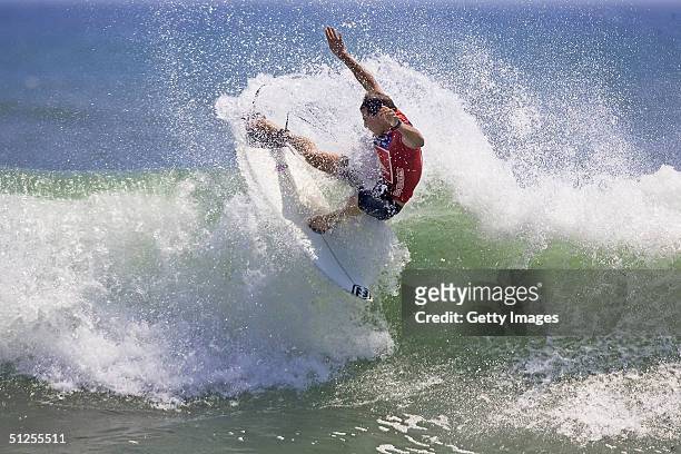 Defending champion Andy Irons of Hawaii rides a wave during the Quiksilver Pro Japan, round six of the Fosters ASP World Championship Tour at Hebara...