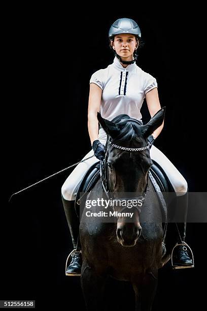 teenager-mädchen reiten im pferdesport porträt - steigbügel stock-fotos und bilder