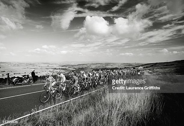 The Cyclists of The Tour of Britian pass over the Pennines into Hebden Bridge during the cycling event on September 2, 2004 in Hebden Bridge, England.
