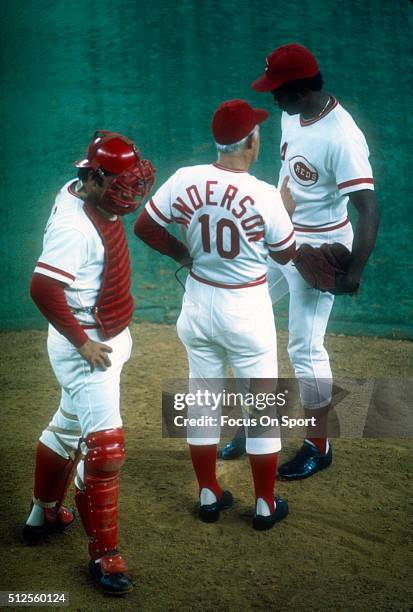 Manager Sparky Anders of the Cincinnati Reds stands on the mound talking with pitcher Pedro Borbon against the Boston Red Sox during Game Four of the...