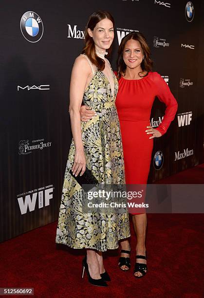 Actress Michelle Monaghan and president of Women In Film Los Angeles Cathy Schulman, in Max Mara, attend Ninth Annual Women In Film Pre-Oscar...