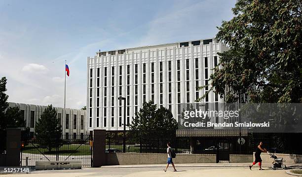 Pedestrian walks past the Russian Embassy September 2, 2004 in Washington, DC. Russian has fallen victim to a series of terrorist attacks the latest...