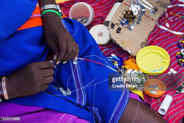 masai handmade acessories - bracelet making stock pictures, royalty-free photos & images