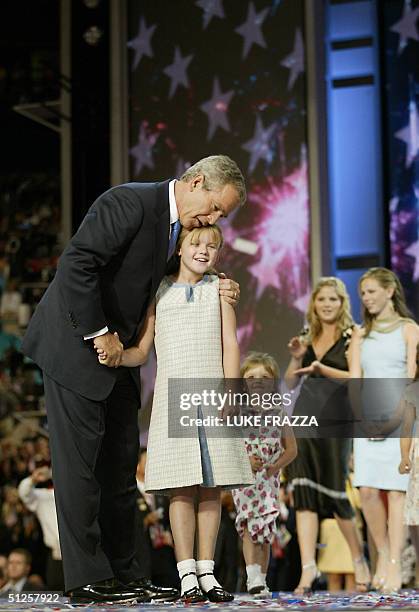 United States: US President George W. Bush embraces Kate Perry, granddaughter of Vice President Dick Cheney at the conclusion of the Republican...