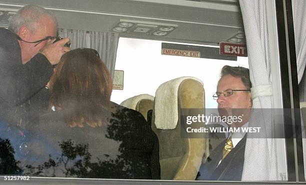Leader of the opposition Labor Party, Mark Latham looks reflective on the media bus after announcing Labor's education policies while campaigning at...