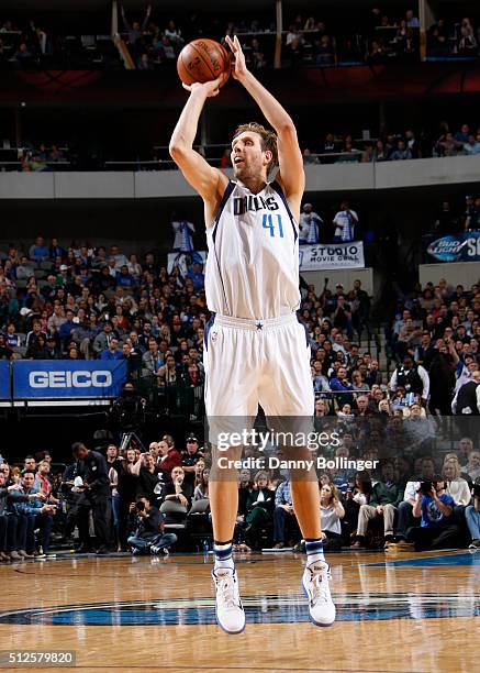 Dirk Nowitzki of the Dallas Mavericks shoots a jumper against the Denver Nuggets on February 26, 2016 at the American Airlines Center in Dallas,...