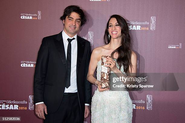 Charles Gillibert and Deniz Gamze Erguven pose with their award for Best Feature Film for the movie 'Mustang' during The Cesar Film Awards 2016 at...