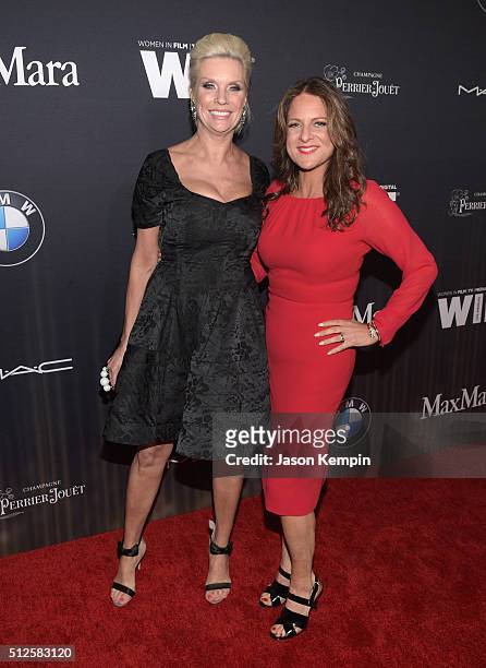 Global Brand President of M.A.C Cosmetics Karen Buglisi Weiler and president of Women In Film Los Angeles Cathy Schulman, in Max Mara, attend Ninth...