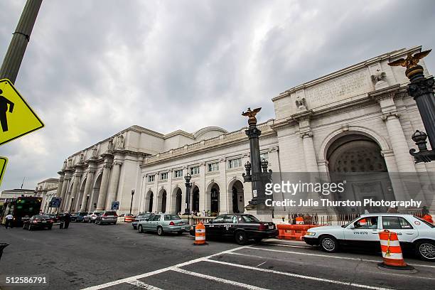 White Granite High Arched Entry With Statues and Inscription in Front of the Original Concourse Hub Exterior Of Union Station Located in Washington...
