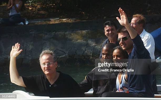 Director Michael Mann with actors Jamie Foxx, Jada Pinkett Smith and Tom Cruise arrive by boat for the "Collateral" Photocall at the 61st Venice Film...
