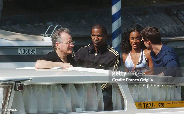 Director Michael Mann with actors Jamie Foxx, Jada Pinkett Smith and Tom Cruise arrive by boat for the "Collateral" Photocall at the 61st Venice Film...