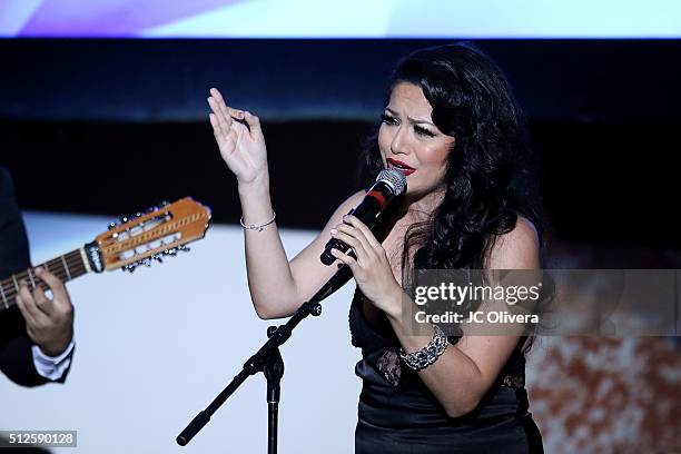 Recording artist Helen Ochoa performs onstage during the 19th Annual National Hispanic Media Coalition Impact Awards Gala at Regent Beverly Wilshire...