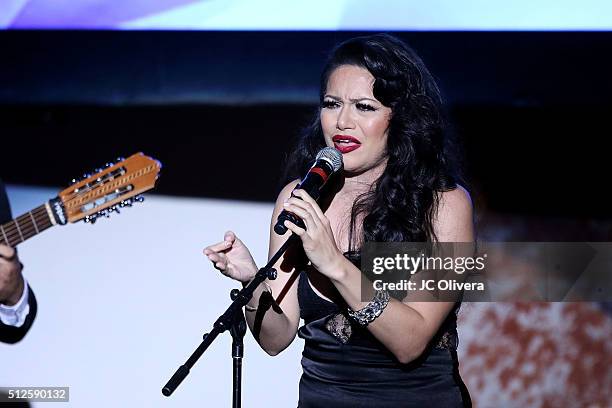 Recording artist Helen Ochoa performs onstage during the 19th Annual National Hispanic Media Coalition Impact Awards Gala at Regent Beverly Wilshire...
