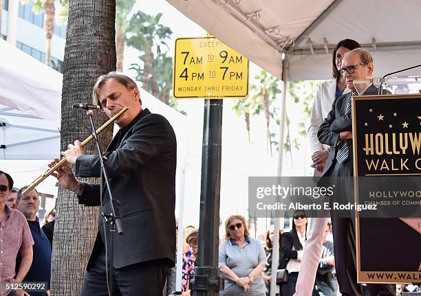 Flutist Andrea Griminelli and composer Ennio Morricone attend a ceremony honoring Ennio Morricone with the 2,575th Star on The Hollywood Walk of Fame...