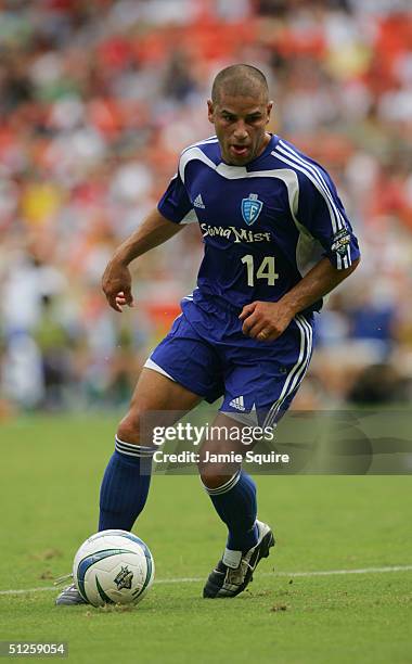 Chris Armas of the East All-Stars dribbles the ball against the West All-Stars during the Sierra Mist MLS All-Star Game at RFK Stadium on July 31,...