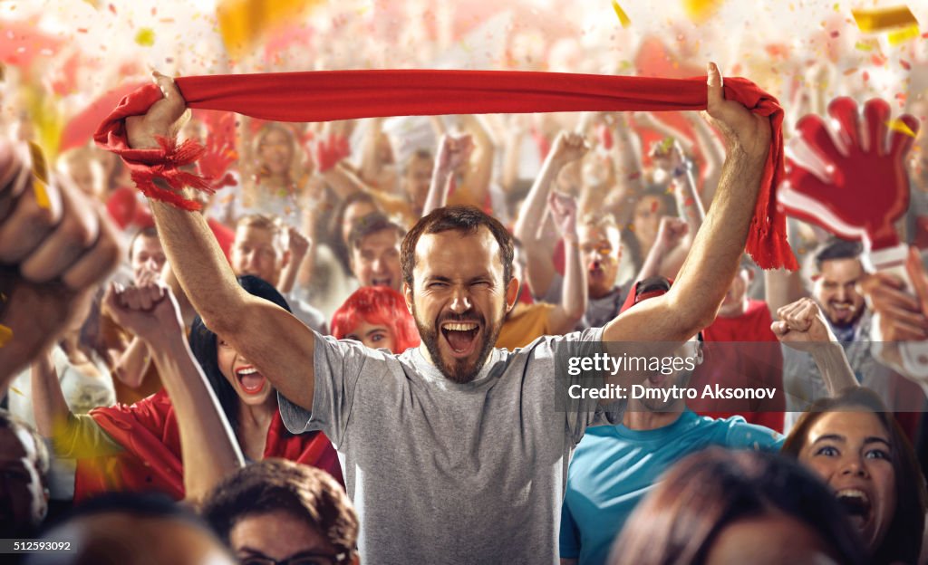 Sport fans: A man with scarf