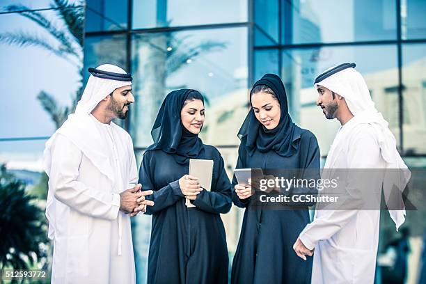 group of uae nationals, dubai, uae - united arab emirates stock pictures, royalty-free photos & images