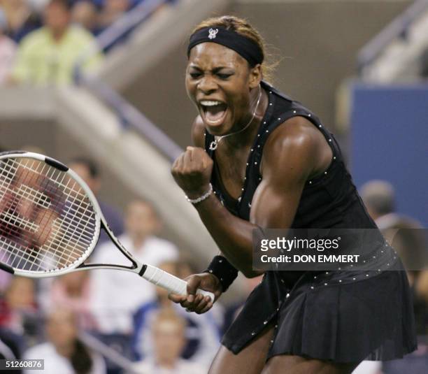 Number three seeded Serena Williams of the US screams after a point against Tatiana Golovin of France 3 September, 2004 at the US Open Tennis...