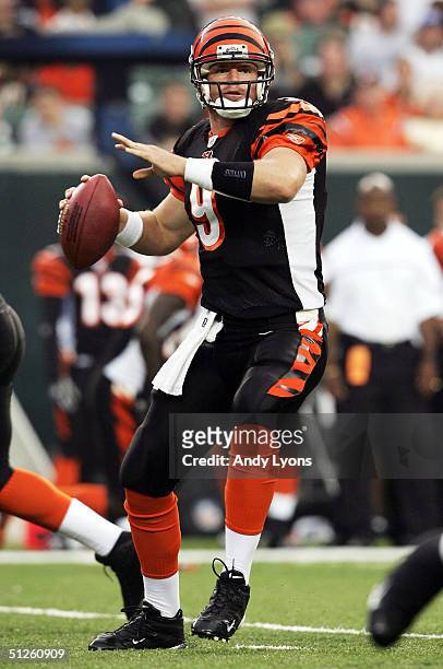 Carson Palmer of the Cincinnati Bengals drops back to pass against the Indianapolis Colts at Paul Brown Stadium on September 3, 2004 in Cincinnati,...