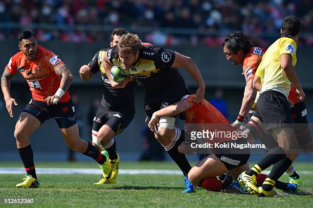 Andries Ferreira of Lions is tackled during the Super Rugby Rd 1 match between Sunwolves and Lions at Prince Chichibu Stadium on February 27, 2016 in...