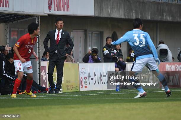 Takafumi Ogura, manager of Nagoya Grampus examines the game during the J.League match between Jubilo Iwata and Nagoya Grampus at the Yamaha Stadium...